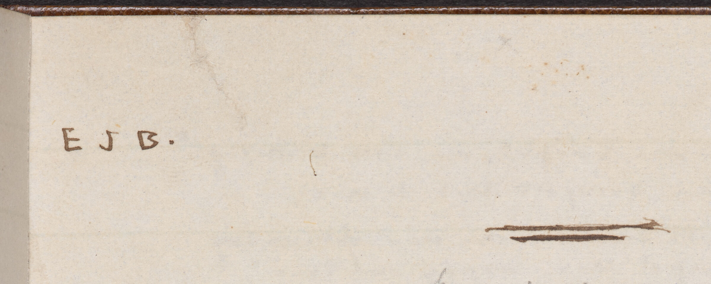Emily Brontë’s block initials EJB enlarged from the opening page of her poetry notebook.